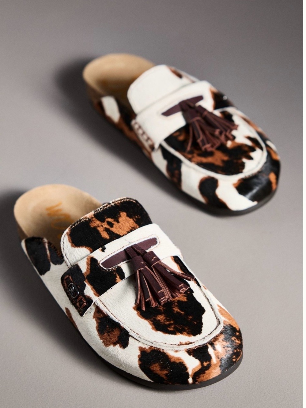 Sam Edelman Cowhide Print Tassel Mules in White, Brown & Black